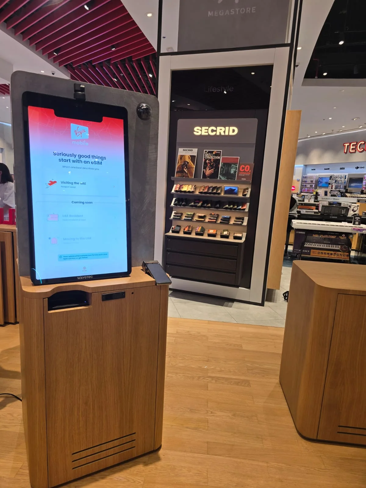 Virgin Mobile eSIM kiosk in a retail setting